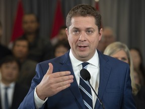 Conservative leader Andrew Scheer responds to questions from the media during a campaign stop in Toronto. Saturday, October 19, 2019.