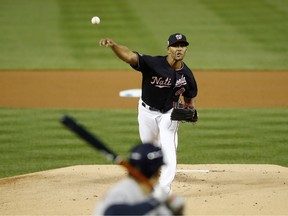 Joe Ross #41 of the Washington Nationals delivers the pitch against the Houston Astros during the first inning in Game Five of the 2019 World Series at Nationals Park on October 27, 2019 in Washington, D.C.