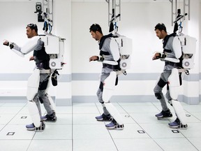 This handout combination of photographs taken on September 2019 and released on October 3, 2019 shows French tetraplegic 'Thibault' as he stands while wearing an exo-skeleton at The University of Grenoble in Grenoble.