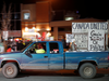 Protestors gather outside a campaign rally by Liberal Leader Justin Trudeau in Calgary, Oct. 19, 2019.