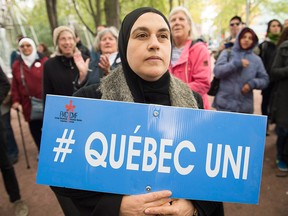 Protesters demonstrate against Bill 21 in Montreal on Oct. 6, 2019. The controversial Quebec secularism law bans some public-sector employees from wearing religious symbols or clothing in the workplace.