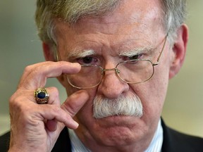 In this file photo taken on August 29, 2019, U.S. National Security Adviser John Bolton answers journalists questions in Minsk.