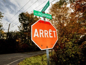 A street sign at Roxham Road near the U.S. and Canada border in Quebec. The number of people walking into Canada and seeking asylum, though down from the historic heights of two years ago, remains high.