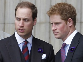 In this file photo taken on June 05, 2012 Britain's Prince William (L) and Prince Harry leave Saint Paul's Cathedral after a national service of thanksgiving for the Queens Diamond Jubilee in London on June 5, 2012.
