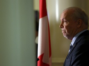 Premier John Horgan answers questions about the recent announcement that B.C. Green Party leader Andrew Weaver won't be running as leader in the next provincial election and about his cabinet minister Jinny Sims' resignation during a press conference in the Hall of Honour at B.C. Legislature in Victoria, B.C., on Monday, October 7, 2019.