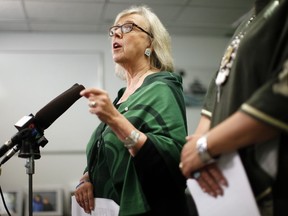 Green Party Leader Elizabeth May announces the Green government will expand the single-payer medicare model to include pharmacare for everyone during a press conference at the campaign office of candidate Racelle Kooy while in Victoria, Wednesday, Oct. 16, 2019.