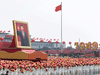 A float with a giant portrait of China’s President Xi Jinping passes by Tiananmen Square in Beijing on Oct. 1, 2019, to mark the 70th anniversary of the founding of the People’s Republic of China.