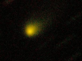 A two-color composite image shows comet 2I/Borisov captured by the Gemini North telescope in Hawaii, U.S. September 10, 2019. This image was taken with eight 60-second exposures, four in green and four in red bands, in this handout obtained October 14, 2019.