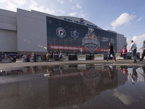 Spectators arrive at the Pepsi Colisee for the Quebec Remparts and Rimouski Oceanics game, Wednesday, May 27, 2015 at the Memorial Cup in Quebec City.