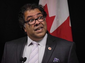 Calgary Mayor Naheed Nenshi speaks to reporters in Calgary, Alta., Friday, Sept. 15, 2017. Nenshi says speculation about him being appointed as a representative or adviser for Alberta in federal cabinet is "silly," but adds he is willing to help bridge the divide between western Canada and the federal government.