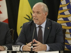 Premier of British Columbia John Horgan speaks to media during the Western Premiers' conference in Edmonton on Thursday, June 27, 2019. Horgan meets with some of the province's most northerly residents as he visits the community of Lower Post, about 10 kilometres south of the Yukon boundary.