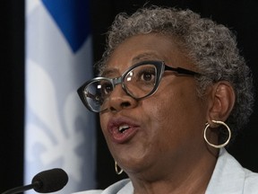 Regine Laurent, president of a commission looking into child protection services, speaks during a news conference, in Quebec City on Thursday, May 30, 2019.
