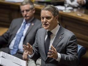 Manitoba Finance Minister Cameron Friesen delivers the 2018 budget at the Manitoba Legislature in Winnipeg on Monday March 12, 2018. A new women's hospital has been completed and is set to open in Winnipeg, more than a decade after it was initially promised.