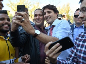 Liberal Leader Justin Trudeau takes a selfie after addressing the media in Winnipeg on Thursday, Sept.19, 2019. The Liberal wave of 2015 was especially pronounced in Winnipeg, where the Grits took seven of eight seats in the city, including ones long-held by the NDP and Conservatives.