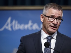 Travis Toews, Minister of Finance, speaks to the media about the MacKinnon Panel report on Alberta???s Finances in Calgary, Alta., Tuesday, Sept. 3, 2019. Alberta's finance minister is hosting two telephone town halls next week to take questions and advice from the public on his upcoming budget.