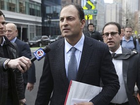 A well-known businessman and philanthropist from British Columbia faces fresh allegations in a new indictment filed in a college bribery scandal unfolding in the United States. David Sidoo, of Vancouver, leaves following his federal court hearing in Boston, Friday, March 15, 2019.