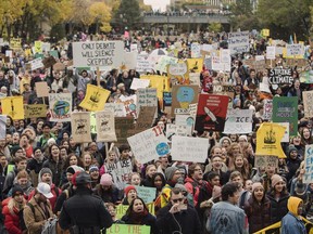 Marchers gather for the Climate Strike in Edmonton, Alta., on Friday, September 27, 2019. Environmental groups are wondering why the federal Conservatives brushed off two surveys on climate change policy when all other main parties furnished detailed, lengthy answers.
