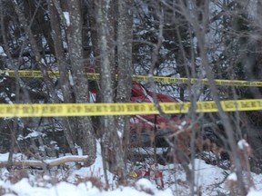 A crashed Hydro One helicopter can be seen near Tweed, Ont., on December 14, 2017. The federal transportation safety watchdog is expected to release the findings of its probe of a Hydro One helicopter crash that killed four men nearly two years ago.