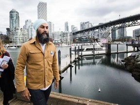NDP leader Jagmeet Singh leaves the boardwalk after speaking to the media during a campaign stop at Granville Island in Vancouver, B.C., on Monday, October 14, 2019.