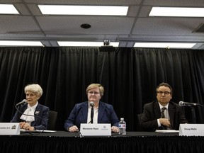 Ethics Commissioner Marguerite Trussler, left, Alberta Public Interest Commissioner Marianne Ryan, and Alberta Auditor General Doug Wylie speak about their findings from their respective independent investigations into the activities related to the International Centre of Regulatory Excellence at the Alberta Energy Regulator, in Edmonton on Friday, Oct. 4, 2019.