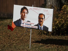 A lawn sign targeting Minister of Natural Resources Amarjeet Sohi and and Liberal Leader Justin Trudeau is seen in Edmonton, Alta., on Thursday, Oct. 3, 2019. Edmonton police say an election lawn sign depicting a target on the forehead of Trudeau and local candidate Sohi is being investigated by the hate crime unit. THECANADIAN PRESS/Jason Franson
