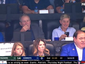 George W. Bush and Ellen DeGeneres Hang Out at a Football Game between the Green Bay Packers and the Dallas Cowboys in Arlington, Texas.