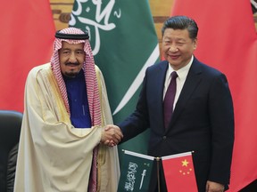 BEIJING, CHINA - MARCH 16:  Chinese President Xi Jinping (R) shake hands with Saudi Arabia's King Salman bin Abdulaziz Al Saud during a signing ceremony at the Great Hall of the People on March 16, 2017 in Beijing, China. At the invitation of President Xi Jinping, King Salman Bin Abdul-Aaziz Al-Saud of the Kingdom of Saudi Arabia will pay a state visit to China from March 15 to 18, 2017.