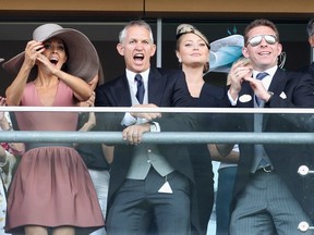 Danielle Bux, Gary Lineker, Holly Valance and Nick Candy watch horses cross the finish line on the opening day of Royal Ascot at Ascot Racecourse on June 14, 2011 in Ascot, United Kingdom.