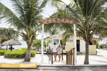 Popular amongst locals and visitors alike, Grape Tree Café is a local fish fry shack serving up local fish, fritters, fried bread fruit and more along with its seaside views.