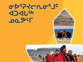 A page from a Nunavut Tourism booklet with Inuktitut writing.