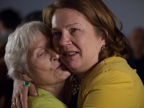 Independent MP Jane Philpott embraces her mother, Audrey Little, after addressing supporters in Stouffville, Ont., after losing her riding in the federal election, on Oct. 21, 2019.