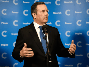 Alberta Premier Jason Kenney speaks with reporters after giving a speech to business leaders at the Calgary Chamber of Commerce on Oct. 1, 2019.