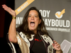 Independent MP Jody Wilson-Raybould waves to the crowd  at Hellenic Community of Vancouver Centre.
