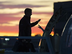 Conservative leader Andrew Scheer boards his campaign plane in Montreal Thursday, October 3, 2019.