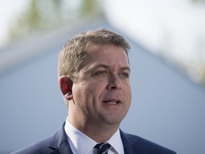 Conservative leader Andrew Scheer makes a morning announcement at the Canada/USA border on Roxham Road during a campaign stop in Lacolle, Que., Wednesday, October 9, 2019.