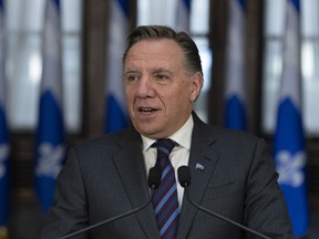 Quebec Premier Francois Legault reacts to the election of a Liberal minority government at the National Assembly in Quebec City, Tuesday, Oct. 22, 2019.