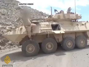 A screen grab from Al Masirah TV/Al Jazeera showing Saudi light armored vehicle captured by Houthi forces.