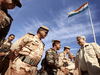 Then-Prime Minister Stephen Harper meets with Kurdish Peshmerga forces, May 2, 2015.