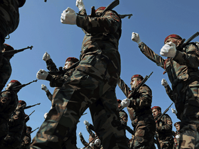 Iraqi Kurdish Peshmerga officers march during a graduation ceremony on Oct. 16, 2019.