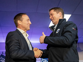 Peter MacKay with Conservative Leader Andrew Scheer at a campaign rally in Little Harbour, N.S., Oct. 17, 2019.