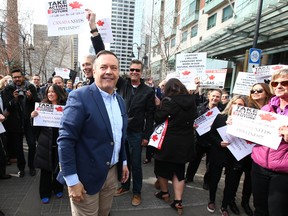 Jason Kenney greets Pro Oil and Pipeline supporters outside the Sheraton Eau Claire in Calgary on Tuesday, April 9, 2019.