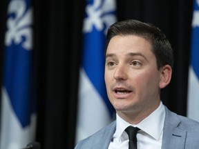 Quebec Minister of Immigration, Diversity and Inclusiveness Simon Jolin-Barrette speaks at a news conference at the legislature in Quebec City on March 28, 2019. Jolin-Barrette now says there is no plan to bring in legislation to prevent retail workers from greeting their customers with "bonjour/hi," three days after he raised the possibility of banning the bilingual greeting.