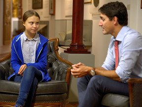 Prime Minister Justin Trudeau greets Swedish climate-change teen activist Greta Thunberg on Sept. 27, 2019.