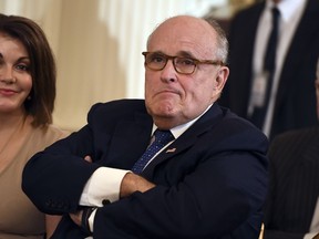 In this file photo taken on July 9, 2018 lawyer of US president Donald Trump, Rudy Giuliani looks on before the US president announces his Supreme Court nominee in the East Room of the White House in Washington, DC.