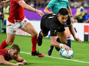 New Zealand wing Rieko Ioane scores the All Blacks' fifth try during the Rugby World Cup Pool B match between New Zealand and Canada at the Oita Stadium in Oita on Oct. 2, 2019.