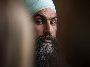 NDP leader Jagmeet Singh listens to a question as he holds a press conference following a meeting with his caucus in Ottawa on Wednesday Oct. 30, 2019.