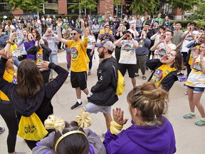 Laurier Brantford students take part in a cheer-off  Wednesday during the annual mayor's lunch at downtown Harmony Square, part of Orientation Week activities to introduce 800 first-year students to the campus and community.
