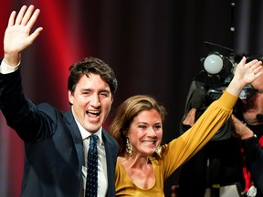 Liberal Leader Justin Trudeau and his wife, Sophie Gregoire Trudeau, celebrate the Liberals' federal election win at the Palais des Congres in Montreal on Oct. 22, 2019.