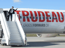 Liberal Leader Justin Trudeau boards one of his campaign planes in Ottawa. He has two: one for passengers, and the other for cargo.