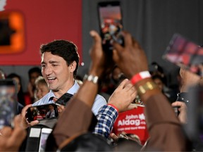 Liberal Leader Justin Trudeau is greeted by supporters during an election campaign rally in Surrey, B.C., on Sept. 24, 2019.